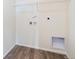 Laundry room features a wire shelf with washer and dryer hookups providing a practical space at 13575 E 110Th Ln, Commerce City, CO 80022