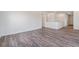 Spacious living area with hardwood floors and bright natural light at 13575 E 110Th Ln, Commerce City, CO 80022