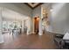 Spacious dining room with modern chandelier, hardwood floors, and easy access to the living spaces at 11691 Riverdale Dr, Parker, CO 80138
