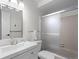 Bright bathroom features a shower/tub combo and chrome fixtures at 2308 Hearth Dr # 36, Evergreen, CO 80439