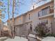 Charming townhome featuring a private balcony, well-maintained landscaping, and a welcoming entrance at 2308 Hearth Dr # 36, Evergreen, CO 80439