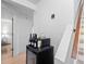 Hallway with hardwood flooring and a wine storage unit, offering convenient access to refreshments at 2308 Hearth Dr # 36, Evergreen, CO 80439