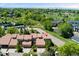 Charming townhome features a tile roof and attached garages in a lush, green community with mountain views at 9117 Nambe Trl, Lone Tree, CO 80124