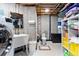 Unfinished basement bathroom, with utility sink, toilet and concrete walls at 9117 Nambe Trl, Lone Tree, CO 80124