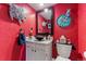 Vibrant powder room featuring a unique vanity with a vessel sink and whimsical animal art at 9117 Nambe Trl, Lone Tree, CO 80124