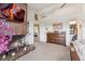 Bedroom features a fireplace and television, along with an adjacent bathroom at 9117 Nambe Trl, Lone Tree, CO 80124
