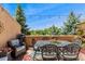 Deck offers seating, a dining area, and an open view, perfect for outdoor enjoyment and entertaining guests at 9117 Nambe Trl, Lone Tree, CO 80124