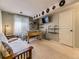 Finished basement with a futon, foosball table, television, and fun decor on the ceiling at 285 N Holcomb St, Castle Rock, CO 80104