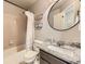 Bathroom with a bathtub and shower combination, and a granite vanity top at 285 N Holcomb St, Castle Rock, CO 80104