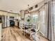 Charming kitchen with an adjacent dining area, creating a warm and inviting space for Gathering meals at 285 N Holcomb St, Castle Rock, CO 80104