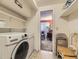 Laundry room with washer and dryer and view into the living space at 285 N Holcomb St, Castle Rock, CO 80104
