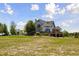 Expansive lawn and lovely two-story home with a spacious deck perfect for entertaining at 3048 Deer Creek Ranch Loop, Parker, CO 80138