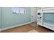 Bedroom with bright windows and bunk beds at 3048 Deer Creek Ranch Loop, Parker, CO 80138