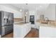 Modern kitchen with stainless steel appliances and granite countertops at 10536 Stonemeadow Dr, Parker, CO 80134