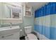 Simple bathroom with a shower/tub combo and updated vanity at 2293 S Oswego Way, Aurora, CO 80014