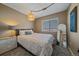 Cozy bedroom with a double bed, nightstand, and a full-length mirror at 2293 S Oswego Way, Aurora, CO 80014