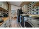 Laundry room with washer and dryer, additional counter space at 2293 S Oswego Way, Aurora, CO 80014