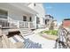 Side yard with steps and snowy ground at 8373 Rush Creek Ave, Littleton, CO 80125