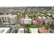 The aerial view showcases the apartment building in a vibrant neighborhood with a mix of residential and commercial buildings at 1196 N Grant St # 705, Denver, CO 80203