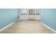 This spacious living room features large windows and light wood flooring at 1196 N Grant St # 705, Denver, CO 80203