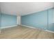 The living room is bright and airy with hardwood floors and neutral-colored walls at 1196 N Grant St # 705, Denver, CO 80203