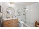 Stylish bathroom featuring a modern vanity, glass-enclosed shower, and elegant fixtures for a spa-like experience at 891 14Th St # 2703, Denver, CO 80202