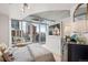 Cozy bedroom with stunning city views, floor-to-ceiling windows, and a modern aesthetic for comfortable urban living at 891 14Th St # 2703, Denver, CO 80202