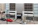Modern commercial building exterior with a prominent entrance and surrounding streetscape at 891 14Th St # 2703, Denver, CO 80202