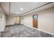 Carpeted hallway with elevators and unit entrances at 891 14Th St # 2703, Denver, CO 80202