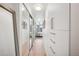 Hallway with mirrored closet doors and ample storage at 891 14Th St # 2703, Denver, CO 80202
