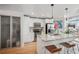 Gourmet kitchen with stainless steel appliances, custom cabinets, and a marble countertop island with bar stool seating at 891 14Th St # 2703, Denver, CO 80202