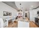 Modern kitchen with stainless appliances, marble countertops, and seating area offer a light airy atmosphere at 891 14Th St # 2703, Denver, CO 80202