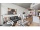 Comfortable living room features wood floors, modern décor, and natural light, perfect for urban living at 891 14Th St # 2703, Denver, CO 80202