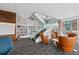 Inviting lounge area with a glass-enclosed staircase, a library, and comfortable seating for relaxation at 891 14Th St # 2703, Denver, CO 80202