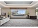 Comfortable resident lounge with a large window offering panoramic views and stylish seating arrangements at 891 14Th St # 2703, Denver, CO 80202