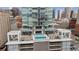 Elevated view of rooftop pool and lounge area with city views, highlighting luxurious amenities at 891 14Th St # 2703, Denver, CO 80202