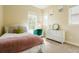 Bright bedroom featuring a cozy bed, white dresser, and natural light from the windows at 6840 Northstar Cir, Castle Rock, CO 80108
