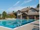Dive into luxury with a community pool, complemented by a clubhouse and plenty of seating at 6840 Northstar Cir, Castle Rock, CO 80108