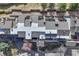 Birds eye view of a condo complex showcasing rooflines, landscaping, and layout of multiple units with decks at 2938 Kalmia Ave # 27, Boulder, CO 80301