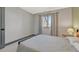 Bright bedroom featuring neutral walls, soft carpet, a window letting in natural light, and dark trim at 2938 Kalmia Ave # 27, Boulder, CO 80301