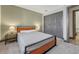 View of the carpeted bedroom featuring neutral paint, wood furniture, and double door closets at 2938 Kalmia Ave # 27, Boulder, CO 80301