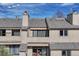 Exterior of a condo complex featuring multiple balconies and neutral colored siding at 2938 Kalmia Ave # 27, Boulder, CO 80301