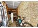 Small storage room with shelving, ladders, bikes, and other household items at 2938 Kalmia Ave # 27, Boulder, CO 80301