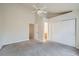 Bedroom boasts vaulted ceilings, neutral walls, plush carpet, and closet space at 3033 W 107Th Pl # D, Westminster, CO 80031