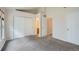Bedroom boasts vaulted ceilings, neutral walls, and a view into ensuite bathroom at 3033 W 107Th Pl # D, Westminster, CO 80031