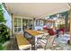 Inviting outdoor patio features a covered dining area with a grill and comfortable seating at 5344 E Otero Dr, Centennial, CO 80122