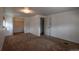 Bedroom featuring a carpet, closet, and a peaceful retreat at 635 2Nd St, Bennett, CO 80102