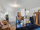 Bedroom with built-in shelving and a desk setup at 635 2Nd St, Bennett, CO 80102