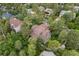 Aerial view showcases the charming neighborhood with lush greenery and well-maintained homes creating a peaceful community at 1122 Forest Trails Dr, Castle Pines, CO 80108