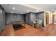 Recreation room with ping pong table, bar area and beautiful floors at 1122 Forest Trails Dr, Castle Pines, CO 80108